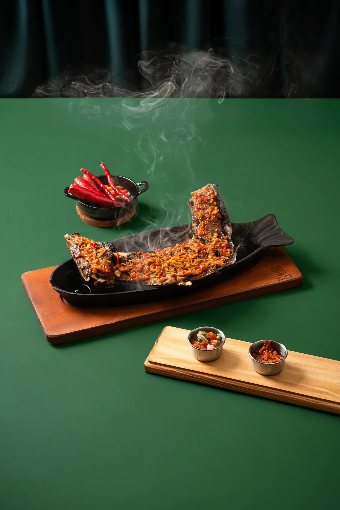 Manado Hot Plate food photography, dish with dark green styling